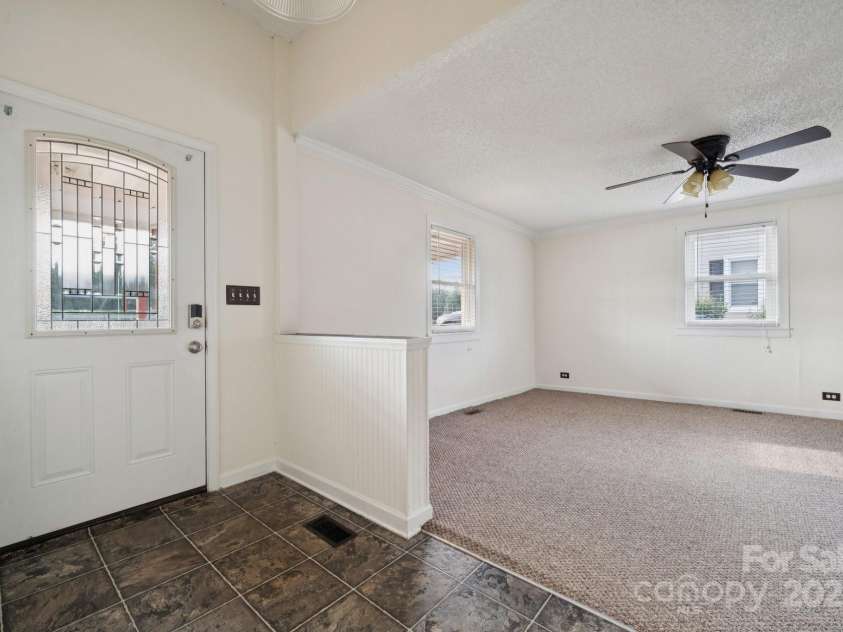 411 Central Avenue, Landis, NC 28088.  MLS# CAR4273594, YatesRealty ID 21497. Foyer to Living Room