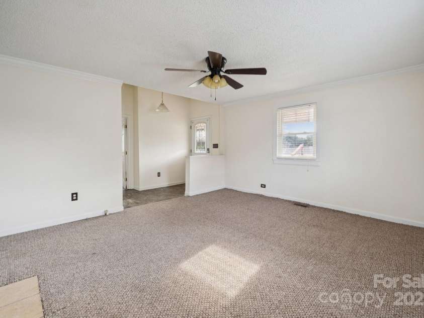 411 Central Avenue, Landis, NC 28088.  MLS# CAR4273594, YatesRealty ID 21497. Living Room