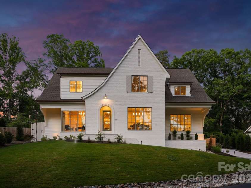 444 Hunter Lane, Charlotte, NC 28211.  MLS# CAR4405254, YatesRealty ID 21498. Front view at twilight.