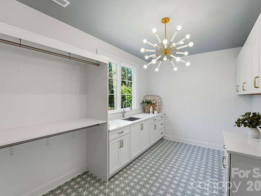 444 Hunter Lane, Charlotte, NC 28211.  MLS# CAR4405254, YatesRealty ID 21498. Laundry room (upper-level).