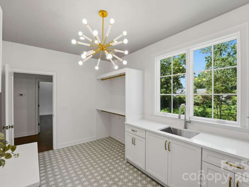 444 Hunter Lane, Charlotte, NC 28211.  MLS# CAR4405254, YatesRealty ID 21498. Laundry room (upper-level).