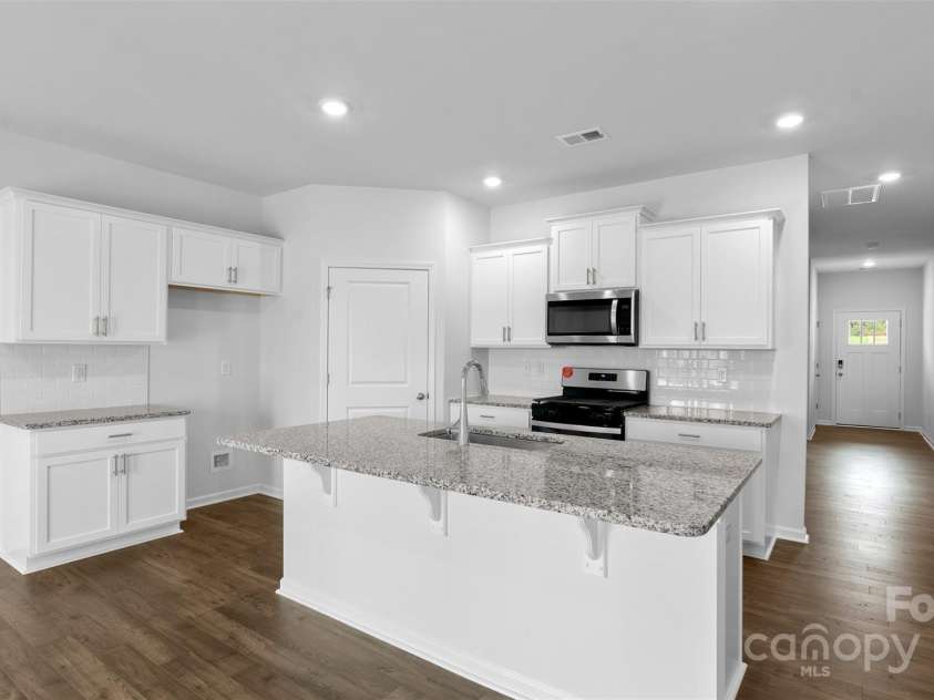 138 Bovine Branch Road, Fletcher, NC 28732.  MLS# CAR4273992, YatesRealty ID 21501. Photos are representative