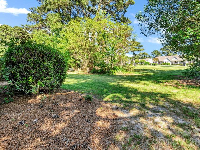 4979 Glen Cove Drive, Southport, NC 28461.  MLS# CAR4369504, YatesRealty ID 21501. 