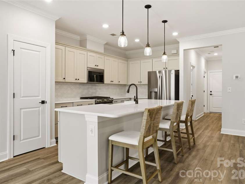 5562 Caneel Lane, Denver, NC 28037.  MLS# CAR4365008, YatesRealty ID 21504. Large Island with stunning quartz