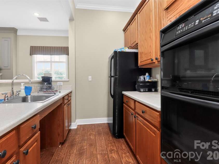 16809 Doe Valley Court, Cornelius, NC 28031.  MLS# CAR4380695, YatesRealty ID 21505. Clubhouse kitchen
