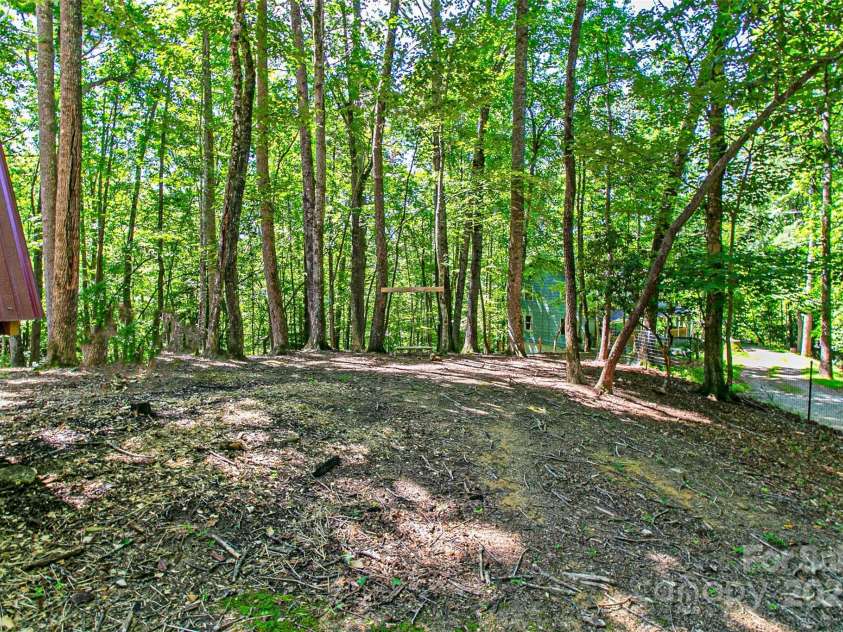 24 Hallelujah Hollow, Pisgah Forest, NC 28768.  MLS# CAR4270636, YatesRealty ID 21507. 