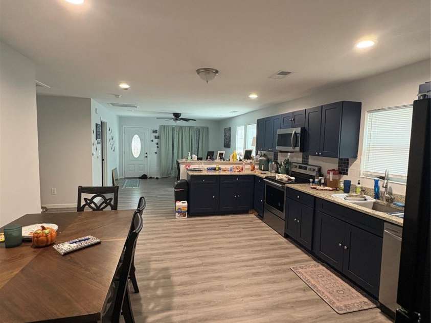 911 Plyler Street, Monroe, NC 28110.  MLS# CAR4356393, YatesRealty ID 21507. Kitchen and Front Rm