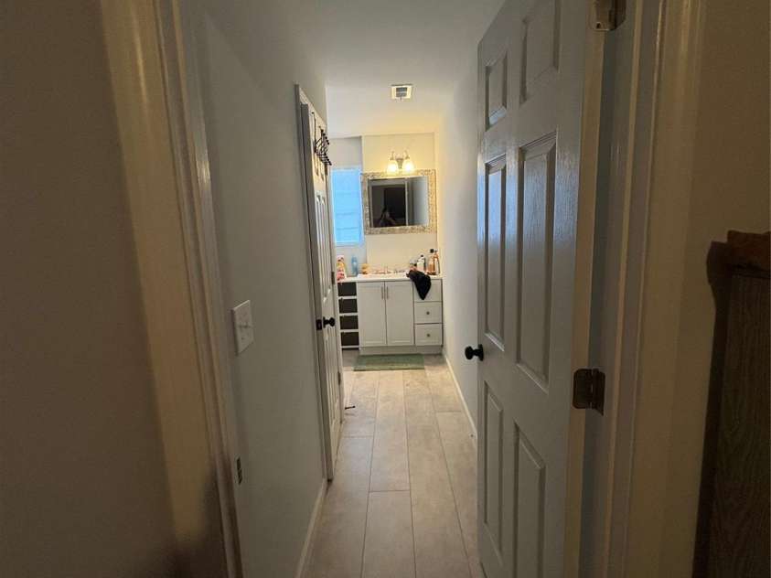 911 Plyler Street, Monroe, NC 28110.  MLS# CAR4356393, YatesRealty ID 21507. Master BR Hallway