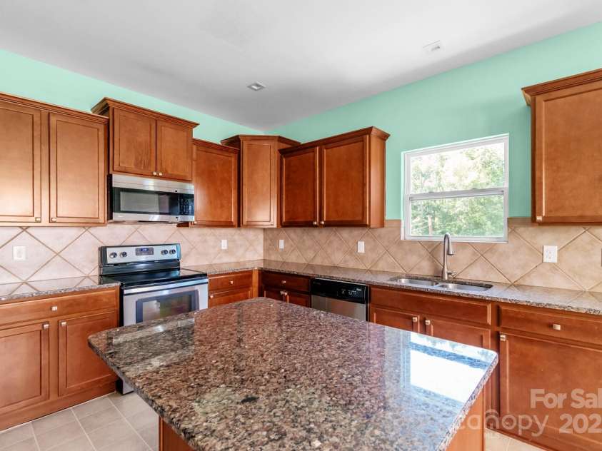 3296 Saddlebrook Drive, Midland, NC 28107.  MLS# CAR4273896, YatesRealty ID 21508. 