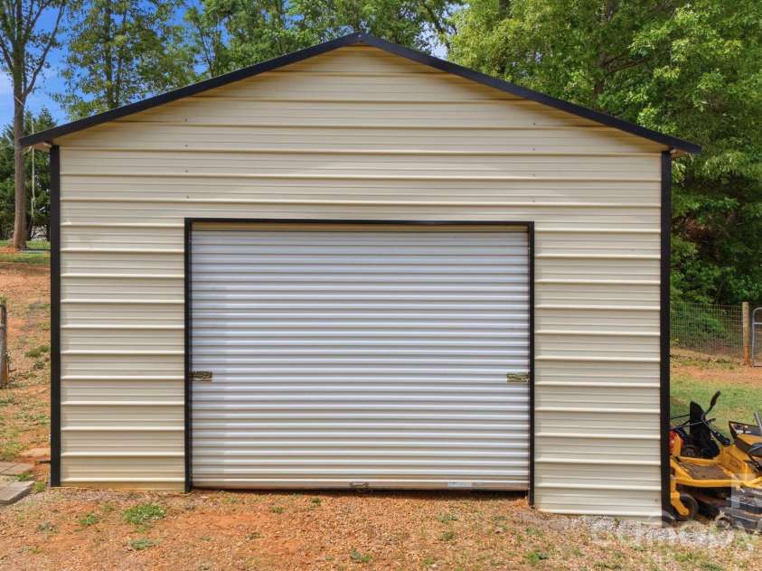980 Lakeland Avenue, Lincolnton, NC 28092.  MLS# CAR4377426, YatesRealty ID 21514. Store your cars in the detached garage 