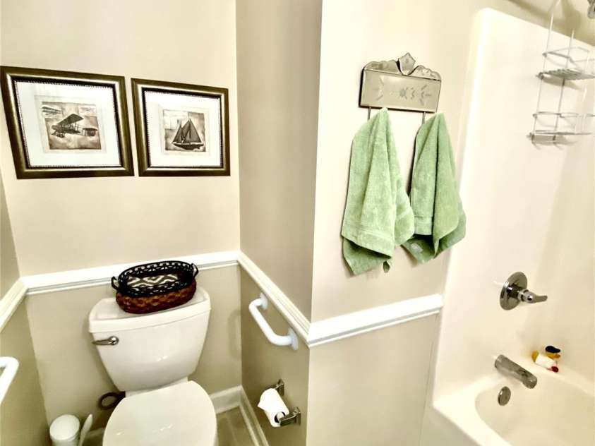 101 Keswick Lane, Mooresville, NC 28117.  MLS# CAR4251834, YatesRealty ID 21518. Bathroom 2 with grab bars & raised toilet seat.