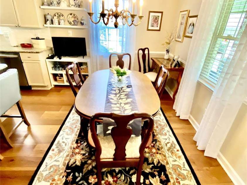 101 Keswick Lane, Mooresville, NC 28117.  MLS# CAR4251834, YatesRealty ID 21518. Dining Area with grand light fixture.