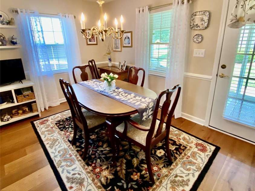 101 Keswick Lane, Mooresville, NC 28117.  MLS# CAR4251834, YatesRealty ID 21518. Dining Room with door and window accress to the Sunroom, 91 sq.ft.
