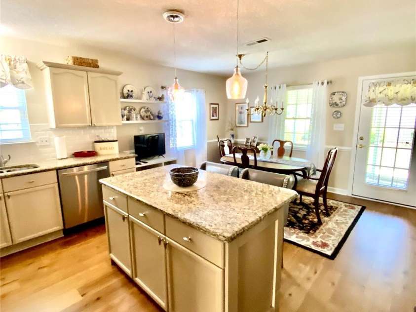 101 Keswick Lane, Mooresville, NC 28117.  MLS# CAR4251834, YatesRealty ID 21518. Kitchen with island and area for stools to sit and eat.