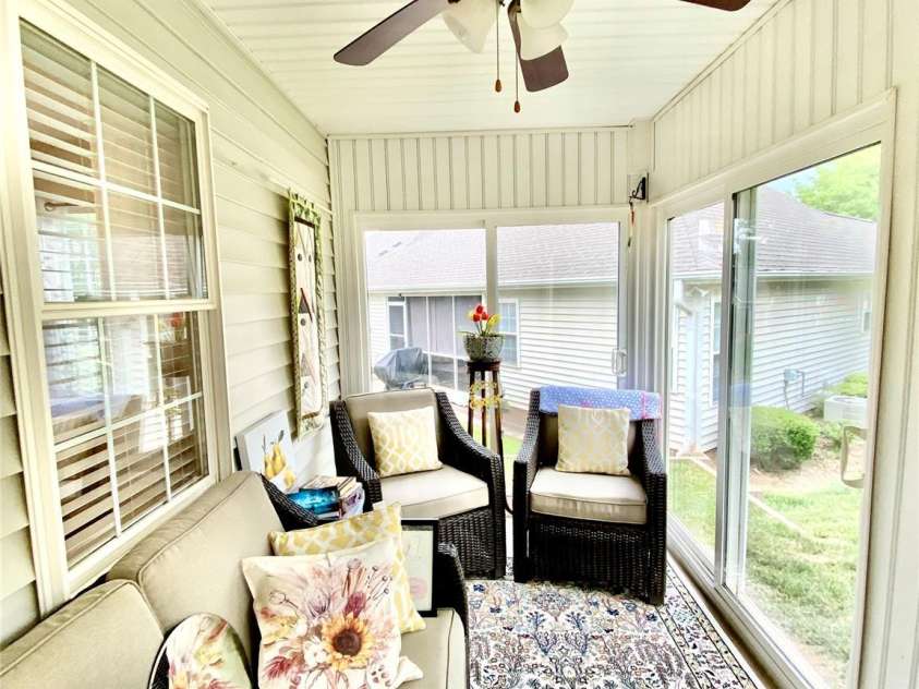101 Keswick Lane, Mooresville, NC 28117.  MLS# CAR4251834, YatesRealty ID 21518. Sunroom off the dining area and Primary Bedroom with ceiling fan/light fixture.
