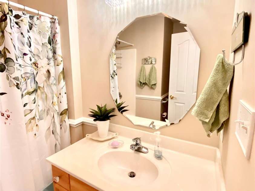 101 Keswick Lane, Mooresville, NC 28117.  MLS# CAR4317962, YatesRealty ID 21518. Bathroom 2 with new light fixture.