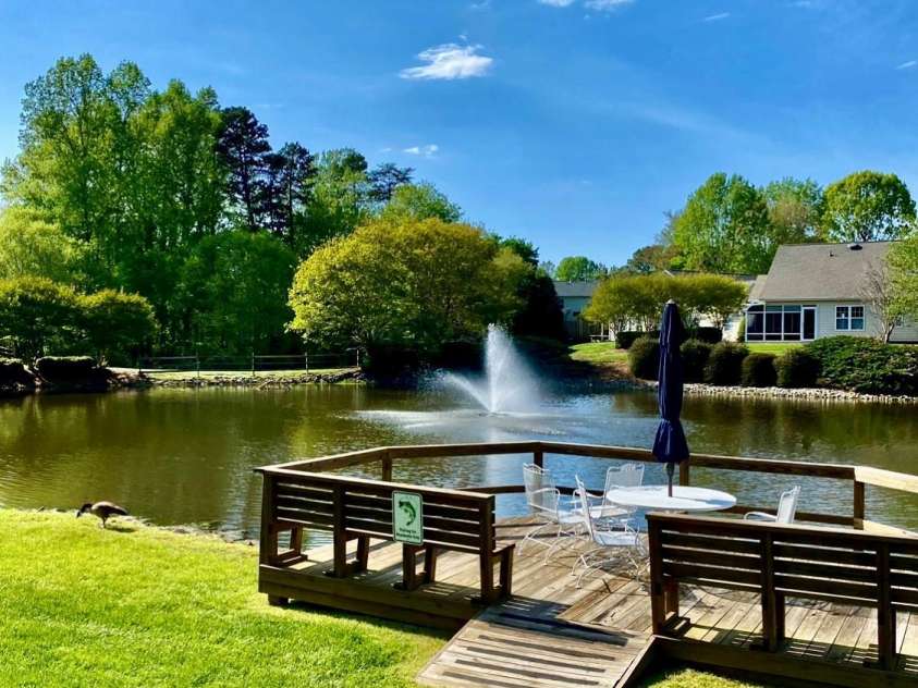 101 Keswick Lane, Mooresville, NC 28117.  MLS# CAR4317962, YatesRealty ID 21518. Deck to relax and enjoy by the Pond near the walking trails.