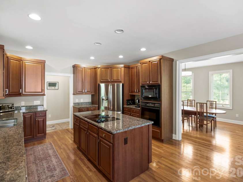 405 Mistletoe Trail, Hendersonville, NC 28791.  MLS# CAR4349682, YatesRealty ID 21518. Kitchen view to dining