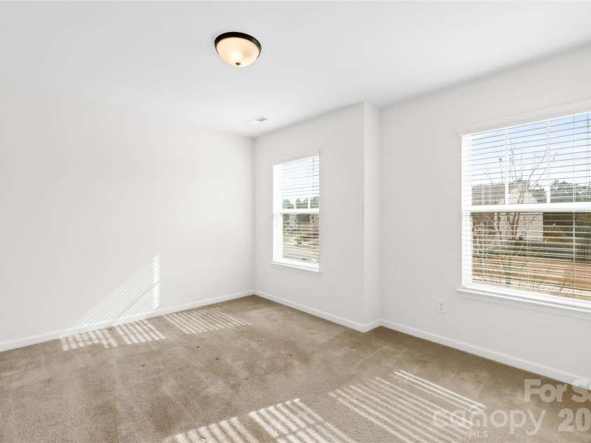 124 Tasman Drive, Mount Holly, NC 28120.  MLS# CAR4353970, YatesRealty ID 21519. 