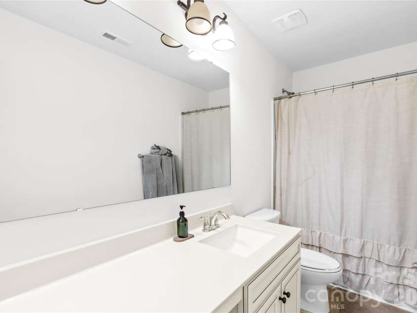 124 Tasman Drive, Mount Holly, NC 28120.  MLS# CAR4353970, YatesRealty ID 21519. 