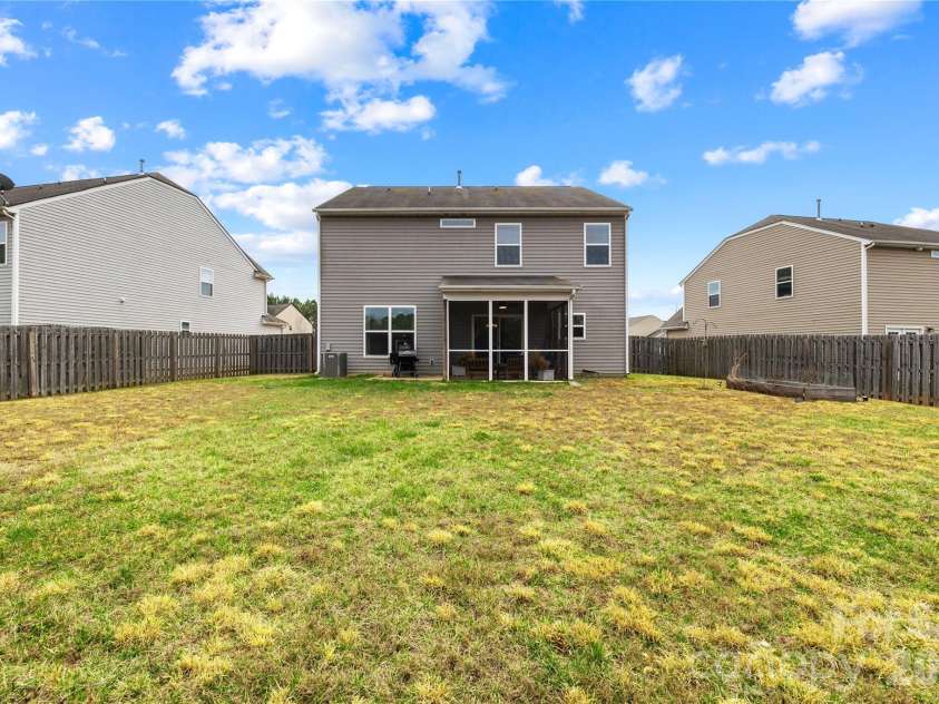 124 Tasman Drive, Mount Holly, NC 28120.  MLS# CAR4353970, YatesRealty ID 21519. 