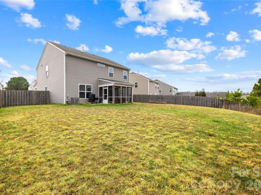 124 Tasman Drive, Mount Holly, NC 28120.  MLS# CAR4353970, YatesRealty ID 21519. 