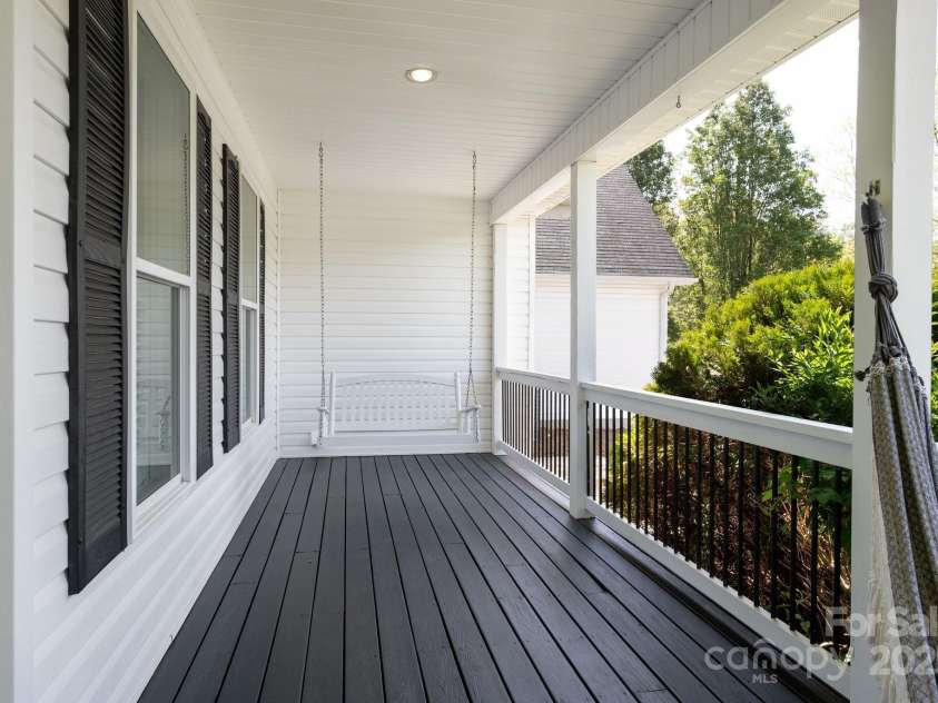 44 White Thorn Drive, Alexander, NC 28701.  MLS# CAR4253765, YatesRealty ID 21522. Front Porch for Swinging