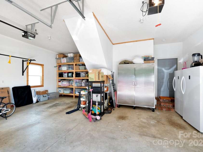 44 White Thorn Drive, Alexander, NC 28701.  MLS# CAR4253765, YatesRealty ID 21522. Inside Main Level Garage