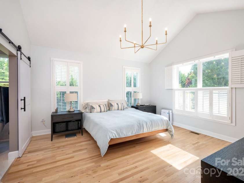 44 White Thorn Drive, Alexander, NC 28701.  MLS# CAR4253765, YatesRealty ID 21522. Primary Bedroom with Vaulted Ceiling and modern Finishes