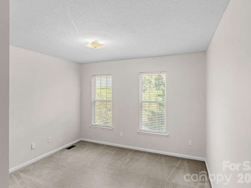 300 Armour Street, Davidson, NC 28036.  MLS# CAR4374388, YatesRealty ID 21526. Bedroom 2, office, nursery . . .