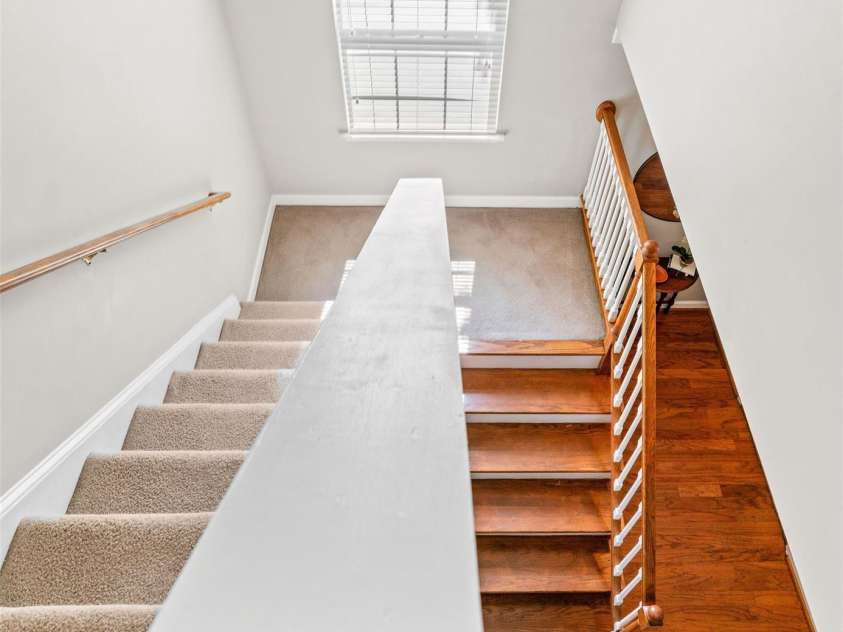 300 Armour Street, Davidson, NC 28036.  MLS# CAR4374388, YatesRealty ID 21526. Sunny central staircase.