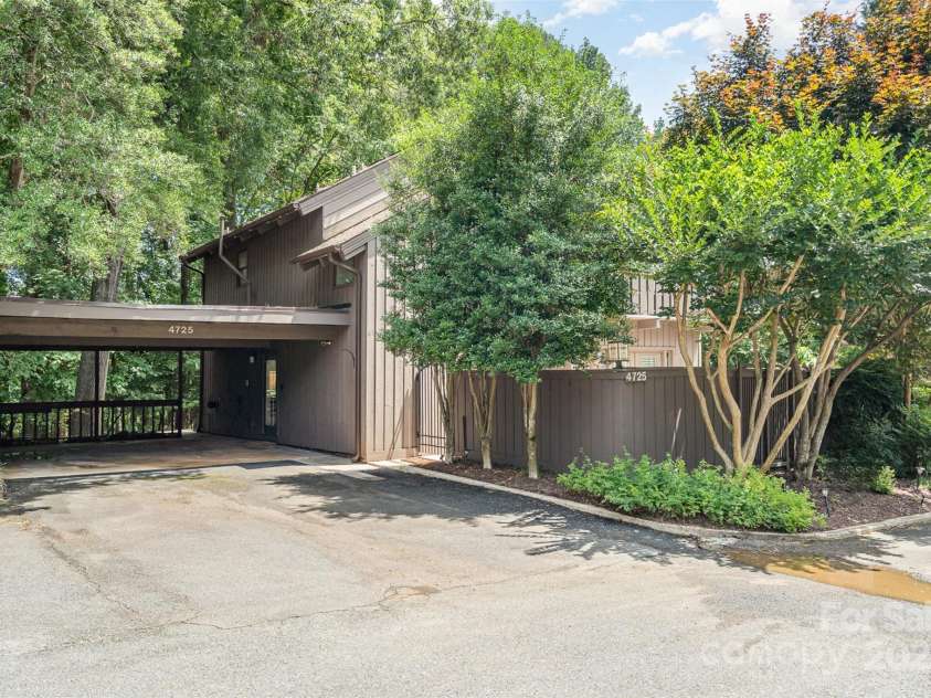 4725 Rounding Run Road, Charlotte, NC 28277.  MLS# CAR4271495, YatesRealty ID 21527. Convenient 2 car carport with added storage.
