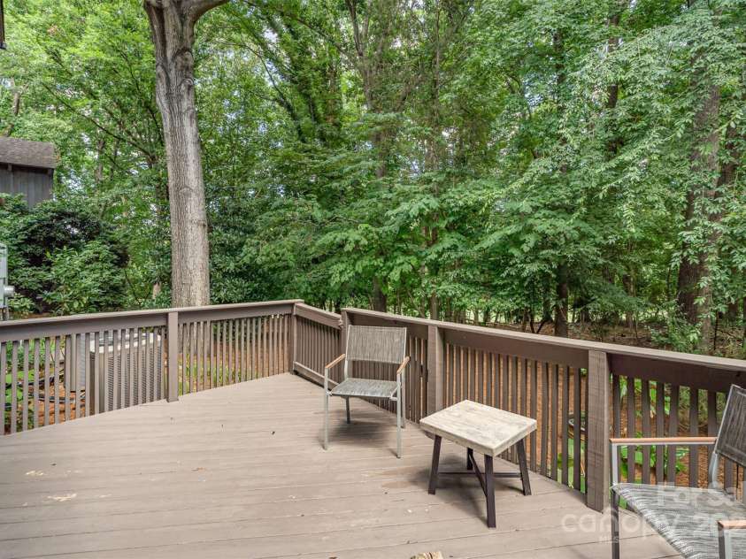 4725 Rounding Run Road, Charlotte, NC 28277.  MLS# CAR4271495, YatesRealty ID 21527. Private rear deck overlooks wooded backyard.