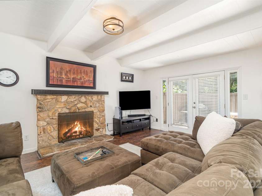 4725 Rounding Run Road, Charlotte, NC 28277.  MLS# CAR4271495, YatesRealty ID 21527. Warming wood burning fireplace w stone surround.