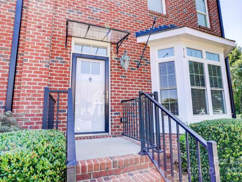 216 Harrison Lane, Locust, NC 28097.  MLS# CAR4244382, YatesRealty ID 21537. End Unit - sound proofing is amazing!