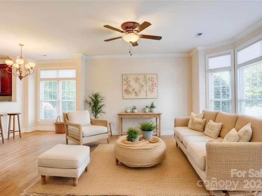 216 Harrison Lane, Locust, NC 28097.  MLS# CAR4244382, YatesRealty ID 21537. Living area with furniture