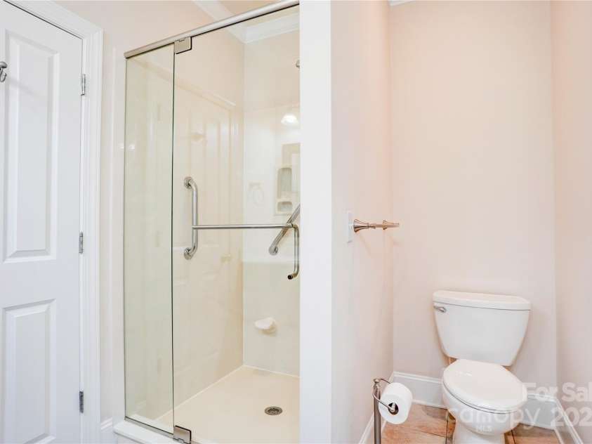 216 Harrison Lane, Locust, NC 28097.  MLS# CAR4244382, YatesRealty ID 21537. Primary suite bath