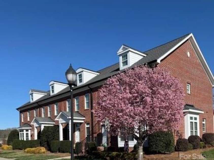 216 Harrison Lane, Locust, NC 28097.  MLS# CAR4244382, YatesRealty ID 21537. Townhome with primary suite downstairs