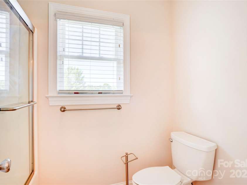 216 Harrison Lane, Locust, NC 28097.  MLS# CAR4244382, YatesRealty ID 21537. Upstairs bath