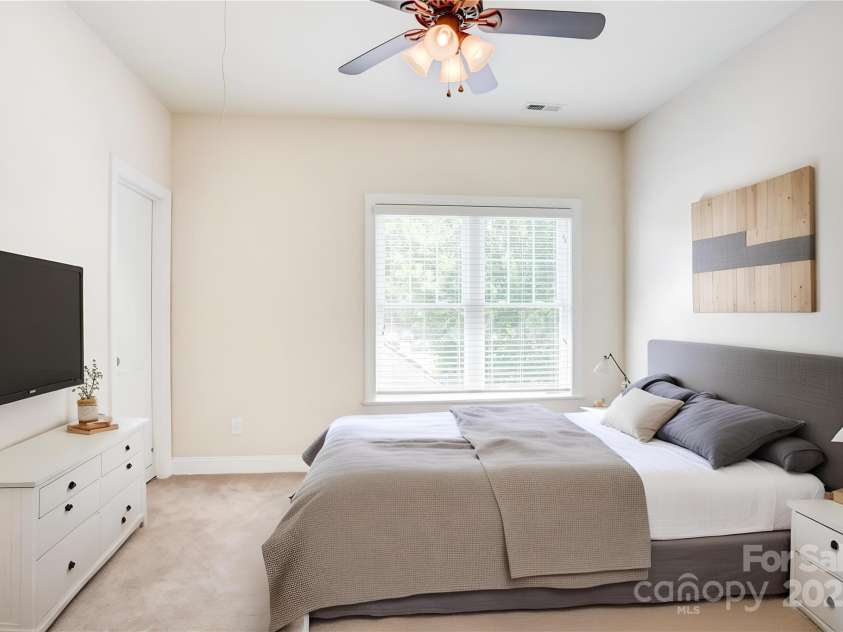 216 Harrison Lane, Locust, NC 28097.  MLS# CAR4244382, YatesRealty ID 21537. Upstairs bedroom 1