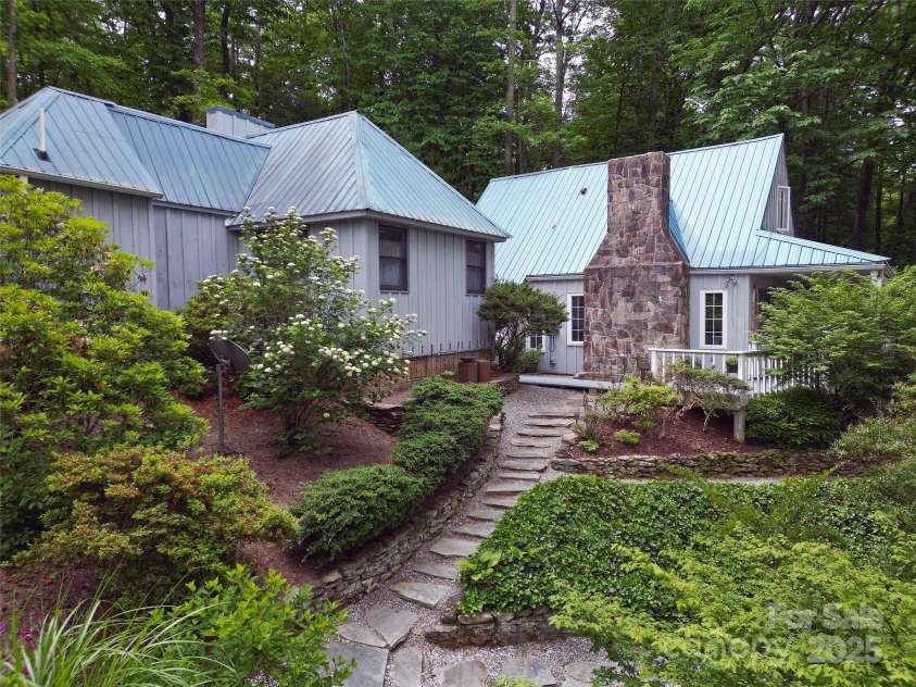 59 Shand Street, Saluda, NC 28773.  MLS# CAR4259487, YatesRealty ID 21538. 59 Shand Cottage and Main House