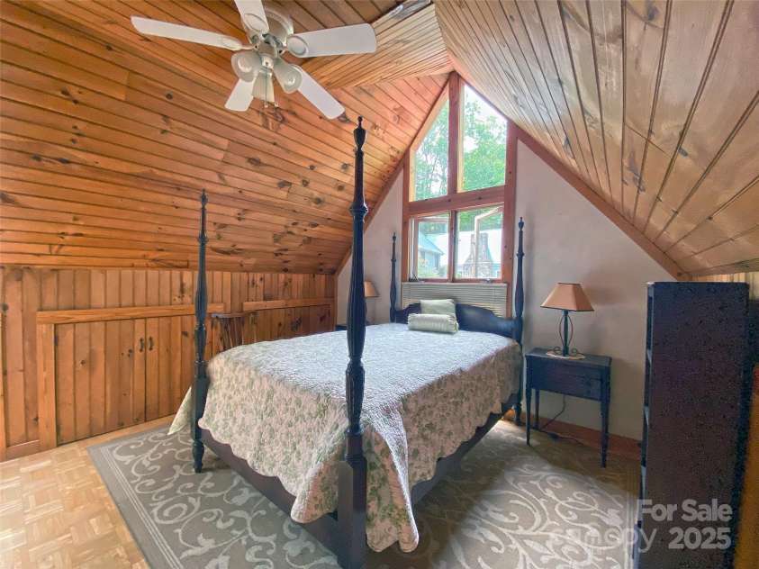 59 Shand Street, Saluda, NC 28773.  MLS# CAR4259487, YatesRealty ID 21538. Apartment-Upstairs Bedroom