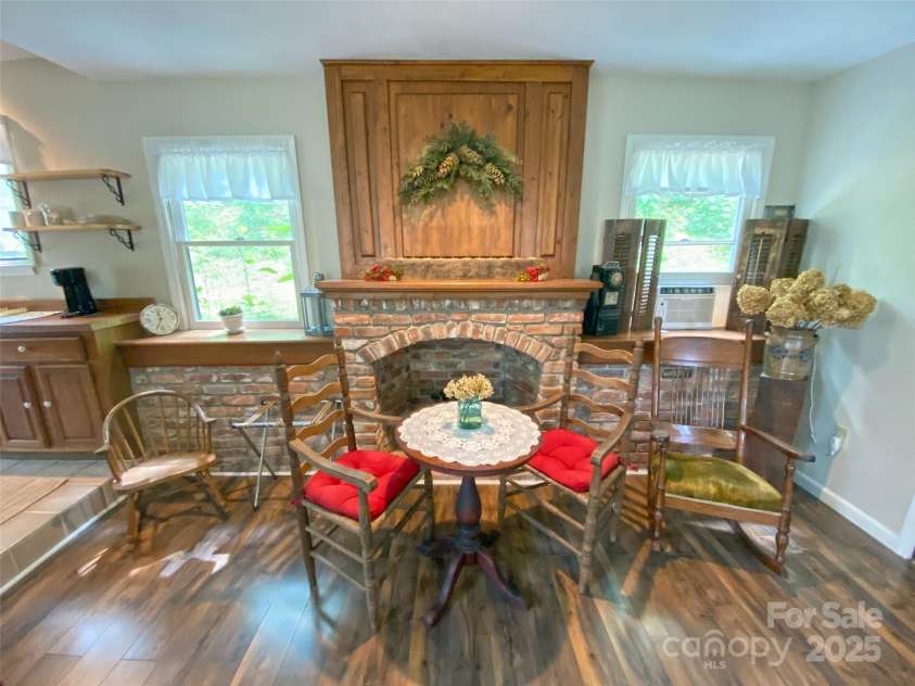 59 Shand Street, Saluda, NC 28773.  MLS# CAR4259487, YatesRealty ID 21538. Cottage-Sitting area