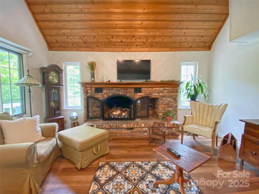 59 Shand Street, Saluda, NC 28773.  MLS# CAR4259487, YatesRealty ID 21538. Main House-Fireplace