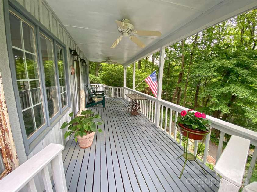 59 Shand Street, Saluda, NC 28773.  MLS# CAR4259487, YatesRealty ID 21538. Main House Front Porch