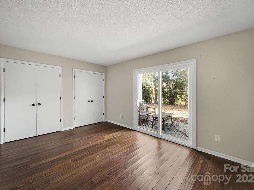 7913 Horse Chestnut Lane, Charlotte, NC 28277.  MLS# CAR4332056, YatesRealty ID 2154. Primary Bedroom with patio walk-out