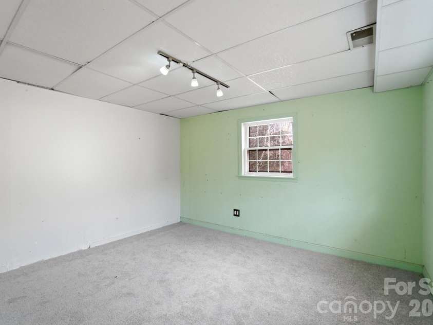 6803 Pencade Lane, Charlotte, NC 28215.  MLS# CAR4349519, YatesRealty ID 21542. Basement bedroom 7
