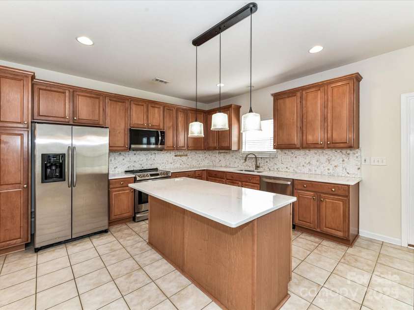 1016 Yellow Daisy Drive, Matthews, NC 28104.  MLS# CAR4268093, YatesRealty ID 21543. 