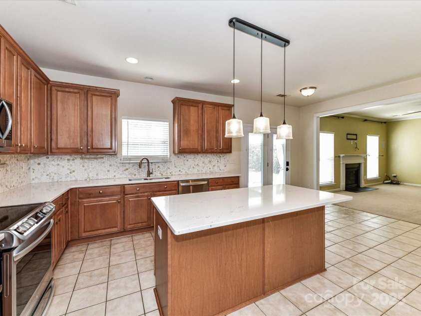 1016 Yellow Daisy Drive, Matthews, NC 28104.  MLS# CAR4268093, YatesRealty ID 21543. 