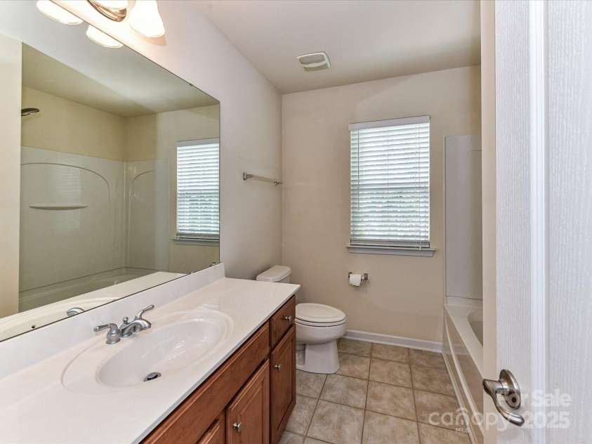 1016 Yellow Daisy Drive, Matthews, NC 28104.  MLS# CAR4268093, YatesRealty ID 21543. 